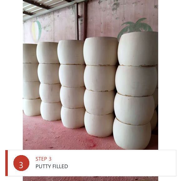 Drum shell seams filled with putty and sanded smooth